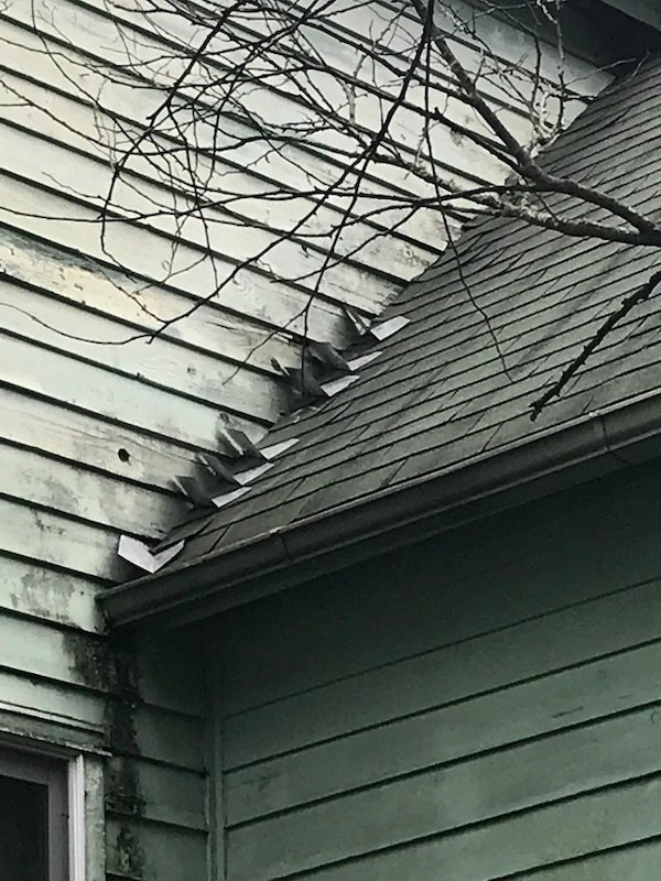 bad flashing job by a cheap roofer